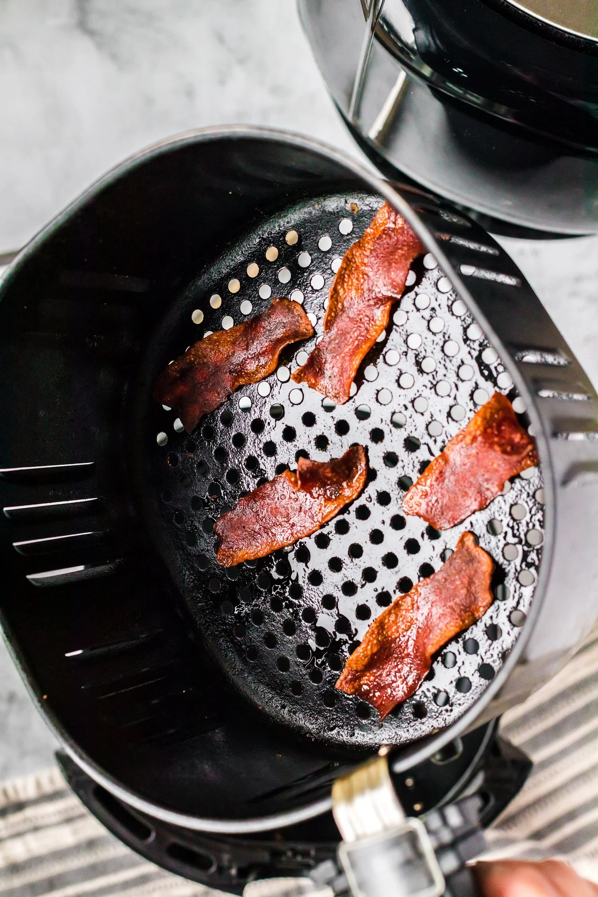 crispy bacon in air fryer basket