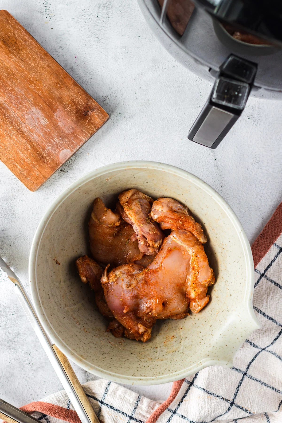 coating chicken thighs in spices