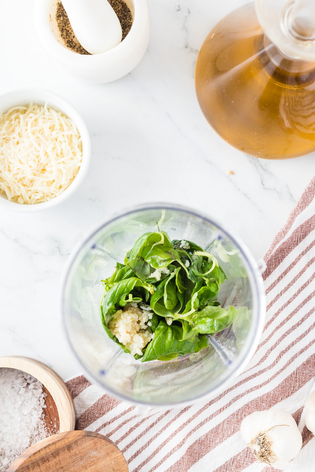 garlic and basil in a food processor 