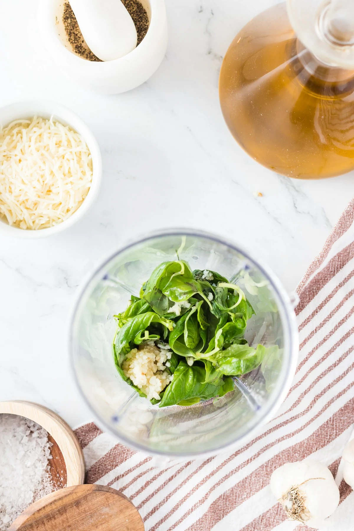 garlic and basil in a food processor 