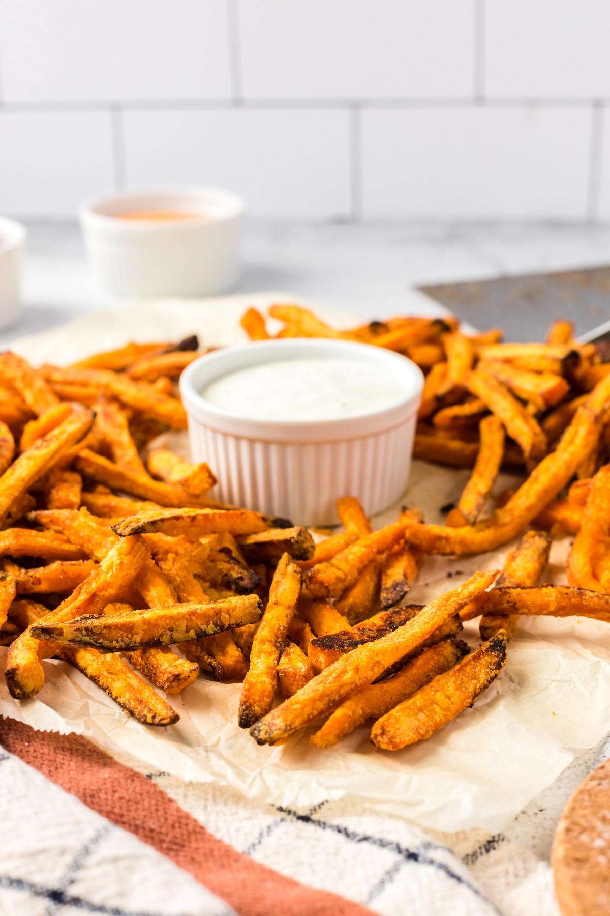 sweet potato fries with sauce in the middle