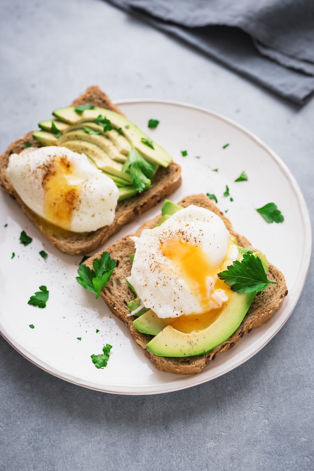 poached eggs on toast with avocado