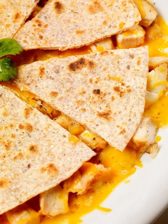 sliced quesadilla with chicken and cheese made in air fryer