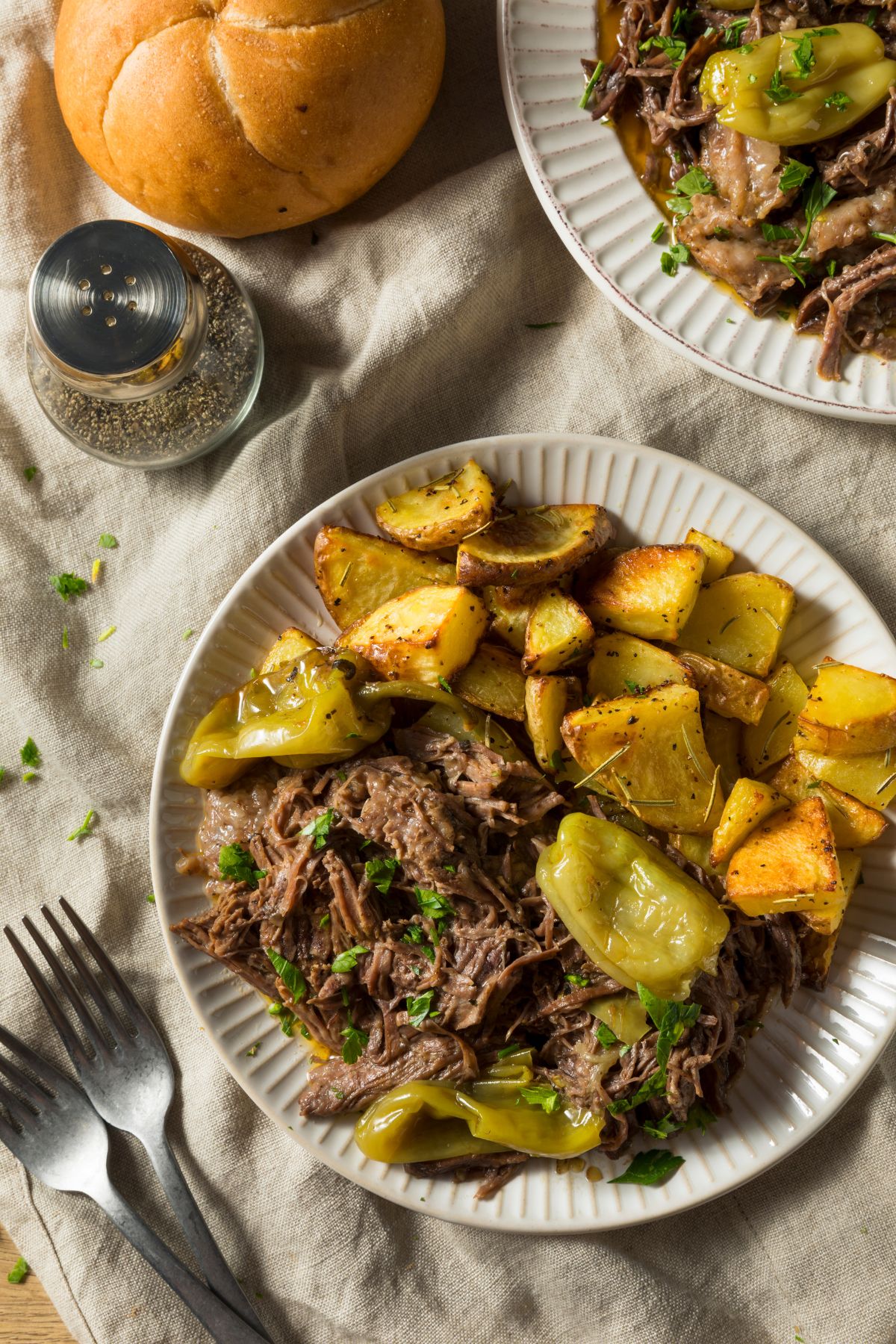 Mississippi pot roast served with roasted potatoes