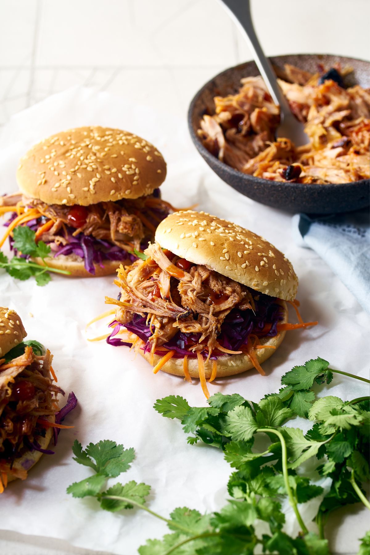 slow cooker pulled pork on sesame buns