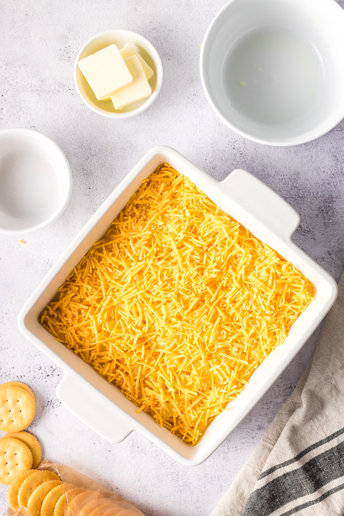 cheddar cheese sprinkled on pineapple casserole